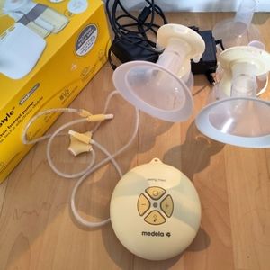 Medela double portable Swing Maxi (complete set + extra accessories)